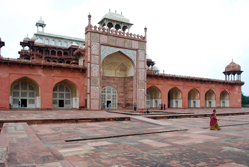 Akbar's Tomb, Sikandra — the southern façade of the Mughal emperor's mausoleum, built in red sandstone with white marble details.